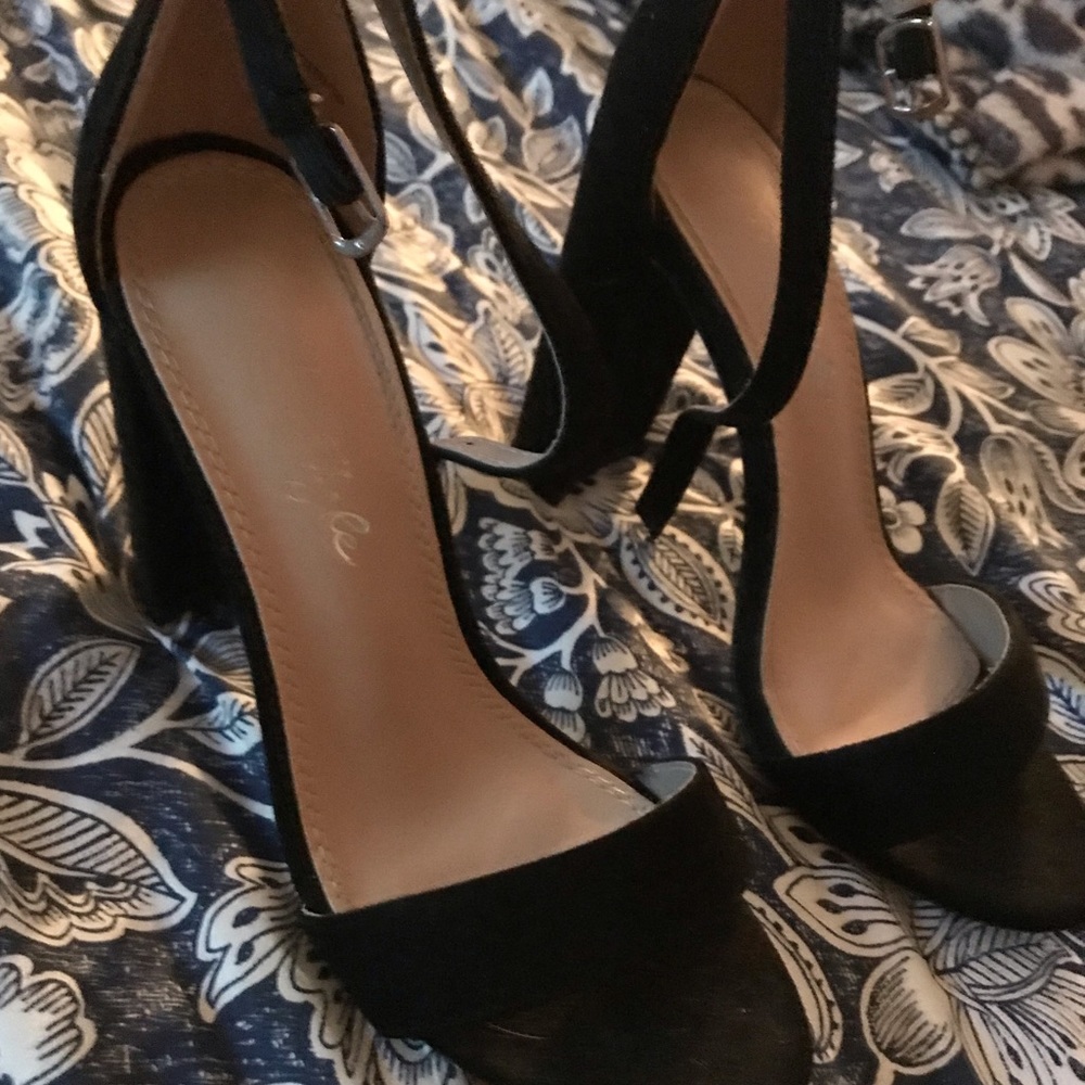 Pair of Suede black open toed heels, worn a couple of times, very comfortable